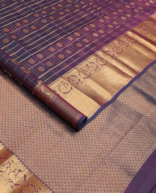 Purple annam chakram enclosed zari checked Vasundhara silk mix saree, zari border of rekku and kodi mayil designs, and jaal pallu