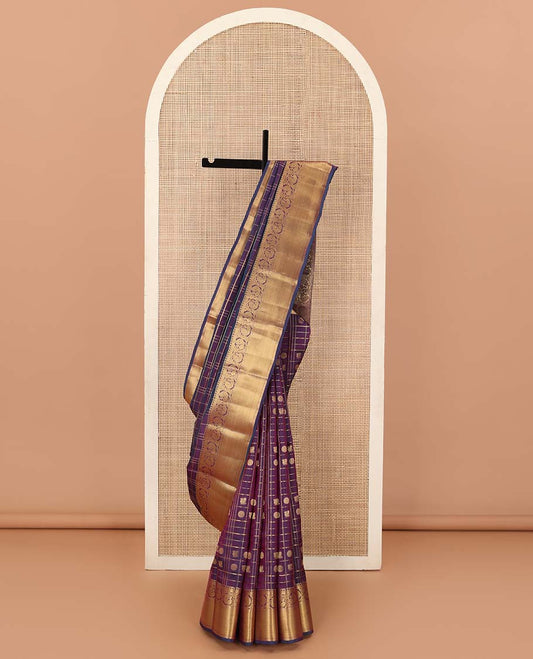 Purple annam chakram enclosed zari checked Vasundhara silk mix saree, zari border of rekku and kodi mayil designs, and jaal pallu