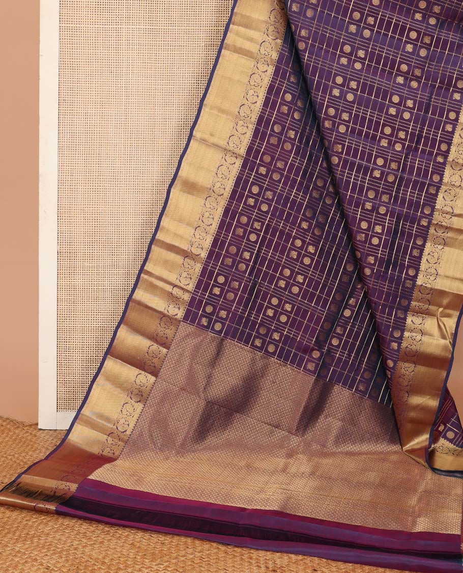 Purple annam chakram enclosed zari checked Vasundhara silk mix saree, zari border of rekku and kodi mayil designs, and jaal pallu