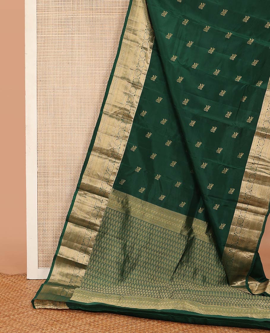 Green zari buttas Vasundhara silk mix saree, zari border of poun, kathir, diamond, neli, mayil kann, and kodi visiry designs, and Jaal patterned pallu