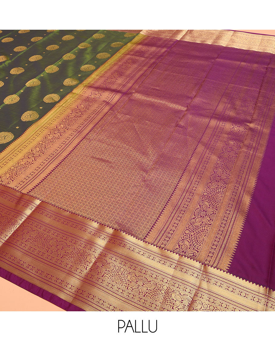 Green Vasundhara Lite Silk Mix Saree Highlighted with Chakram Buttas, Accentuated by a Contrast Border Featuring Rekku, Muthu, Kathir, Chakram, Star, and Mayil Designs, Pallu of Jaal design, and a Contrast Blouse