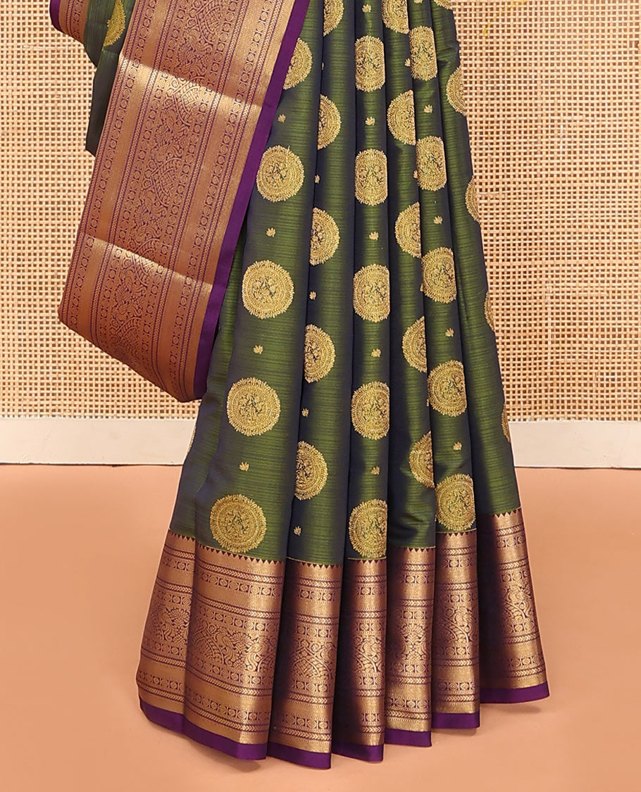Green Vasundhara Lite Silk Mix Saree Highlighted with Chakram Buttas, Accentuated by a Contrast Border Featuring Rekku, Muthu, Kathir, Chakram, Star, and Mayil Designs, Pallu of Jaal design, and a Contrast Blouse