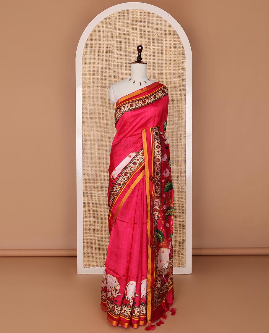 Red Pichwai cow printed banana pith saree with zari border of floral creeper print, and pallu of Pichwai lotus vine and cow print