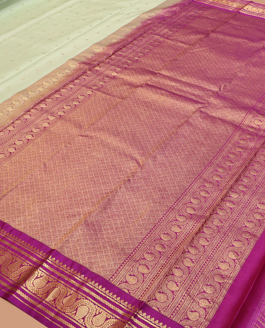 Green zari buttas silk saree, contrast border of thilakam mokku, kathir, banaras, and vanki manga kodi designs, and jaal pallu