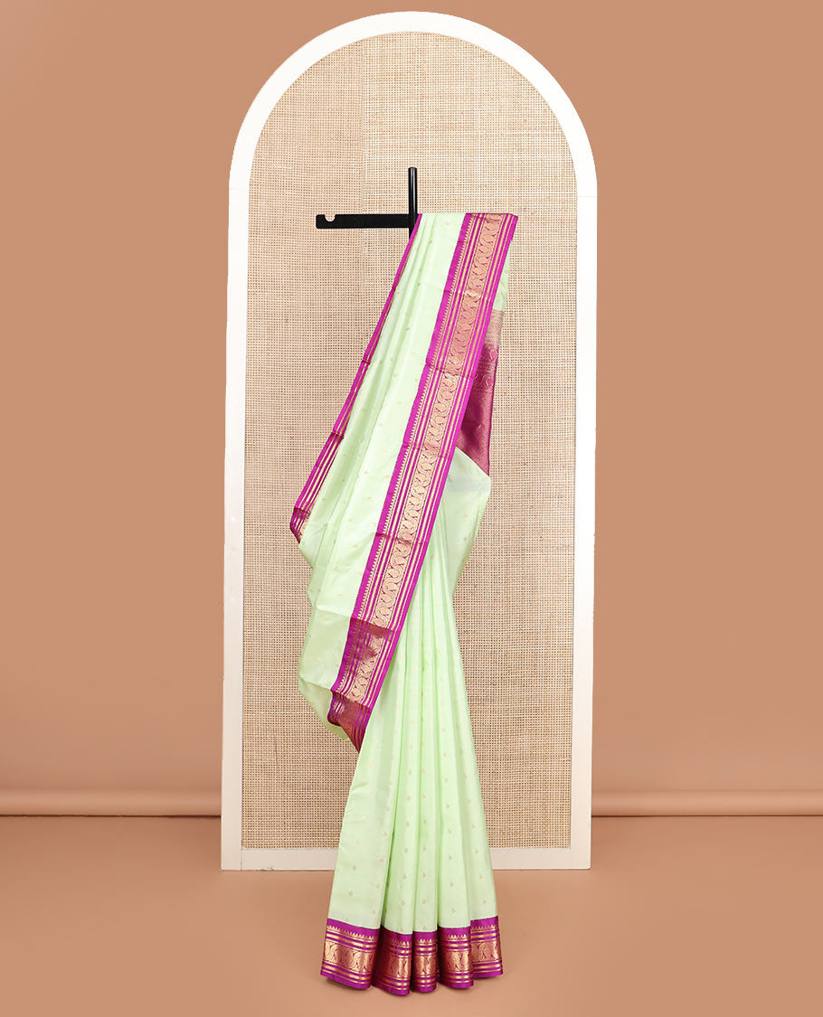 Green zari buttas silk saree, contrast border of thilakam mokku, kathir, banaras, and vanki manga kodi designs, and jaal pallu