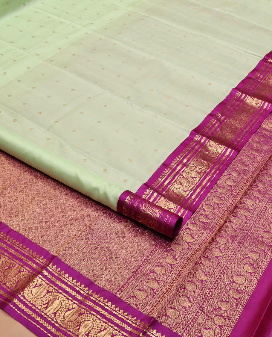 Green zari buttas silk saree, contrast border of thilakam mokku, kathir, banaras, and vanki manga kodi designs, and jaal pallu