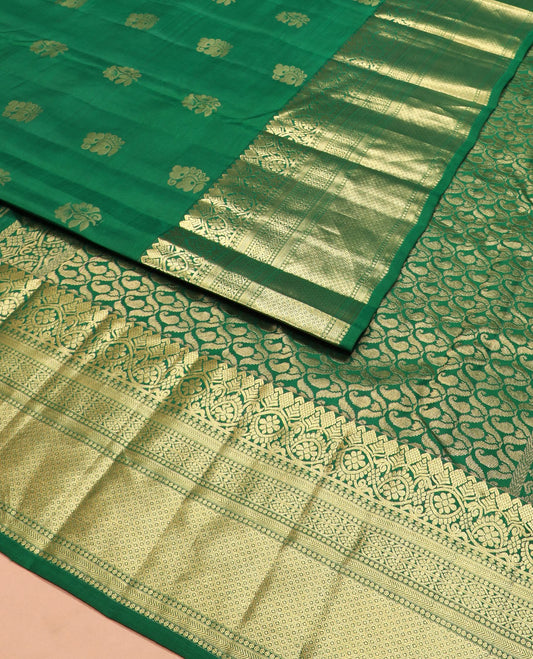 Green zari buttas silk saree, zari traditional design woven border, and pallu of manga butta enclosed checks