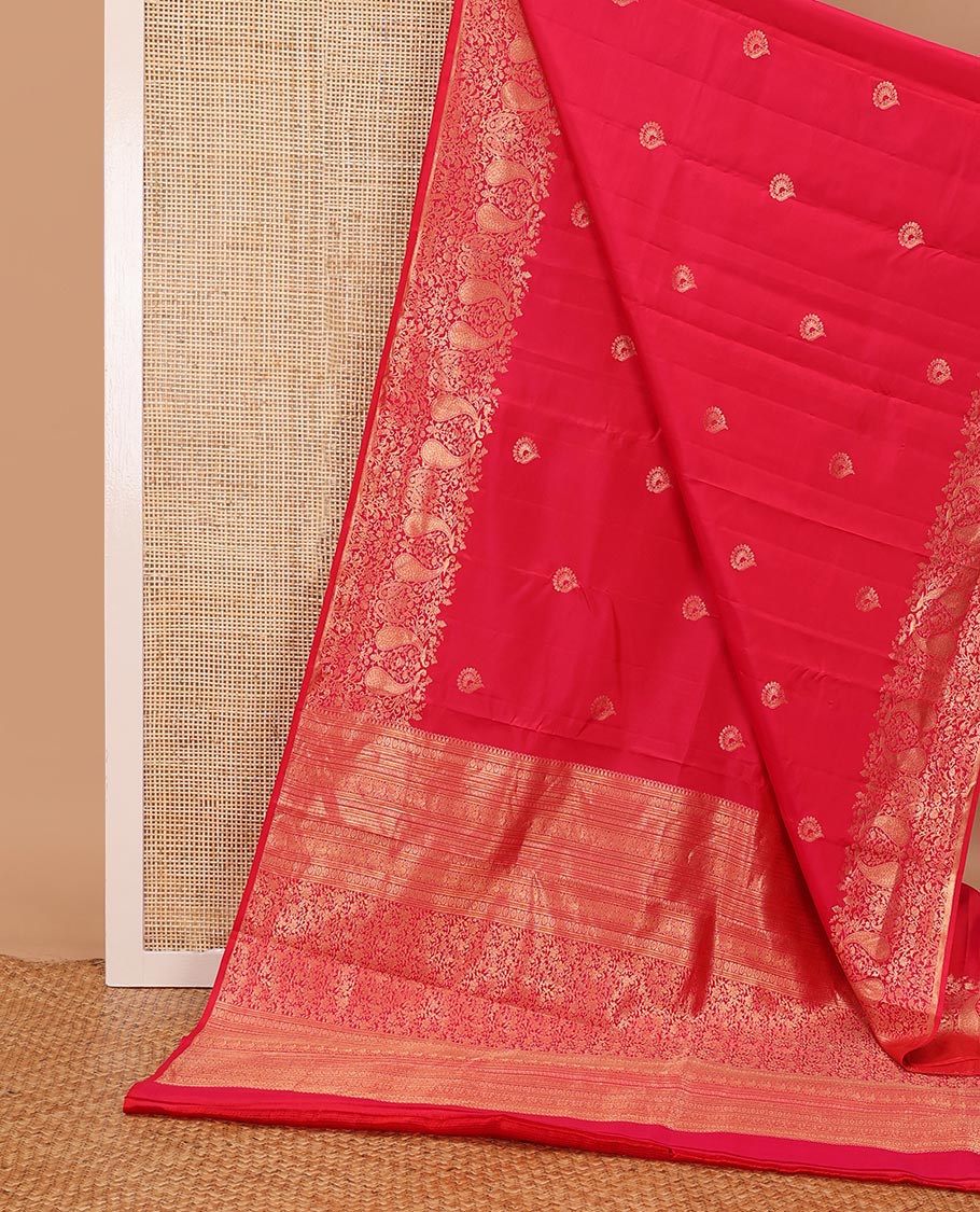 Red zari buttas silksaree,scallop border of floral jaal & mayil & pallu of muthu,banaras,rudraksham,laddu kamalam,neli,mayil & floral jaal design