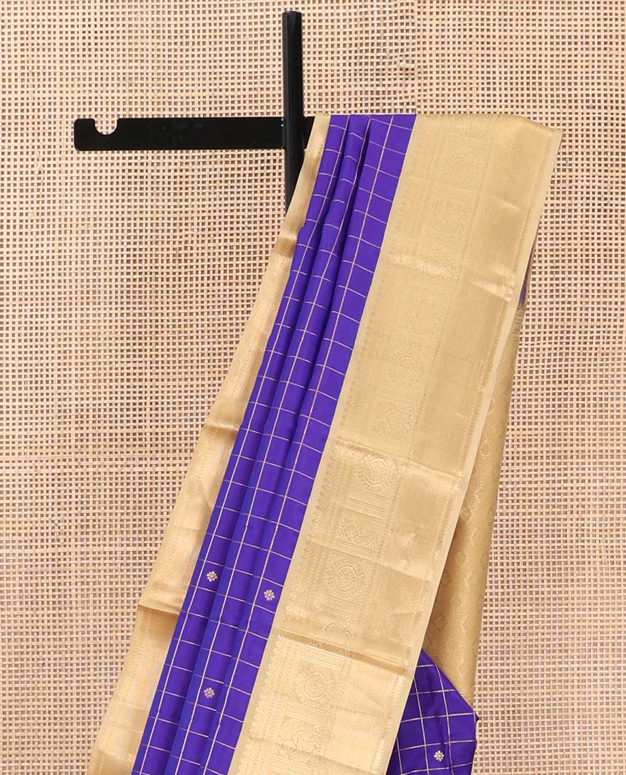 Blue zari kamalam buttas enclosed checked silk saree, contrast border of thilakam mokku, banaras, kathir, and mayil chakram, and jaal pallu