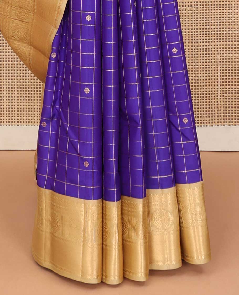 Blue zari kamalam buttas enclosed checked silk saree, contrast border of thilakam mokku, banaras, kathir, and mayil chakram, and jaal pallu