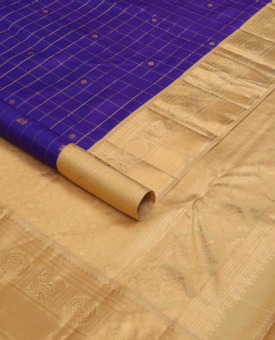Blue zari kamalam buttas enclosed checked silk saree, contrast border of thilakam mokku, banaras, kathir, and mayil chakram, and jaal pallu