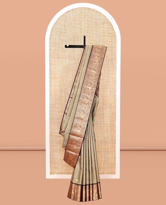 Beige Vasundhara Silk Saree, Meticulously Crafted with Zari Buttas and Checks, a Contrast Border of Thilakam Mokku, Paisa, Kamalam, Yaanai, and Mayil, Jaal Pallu, and a Contrast Blouse
