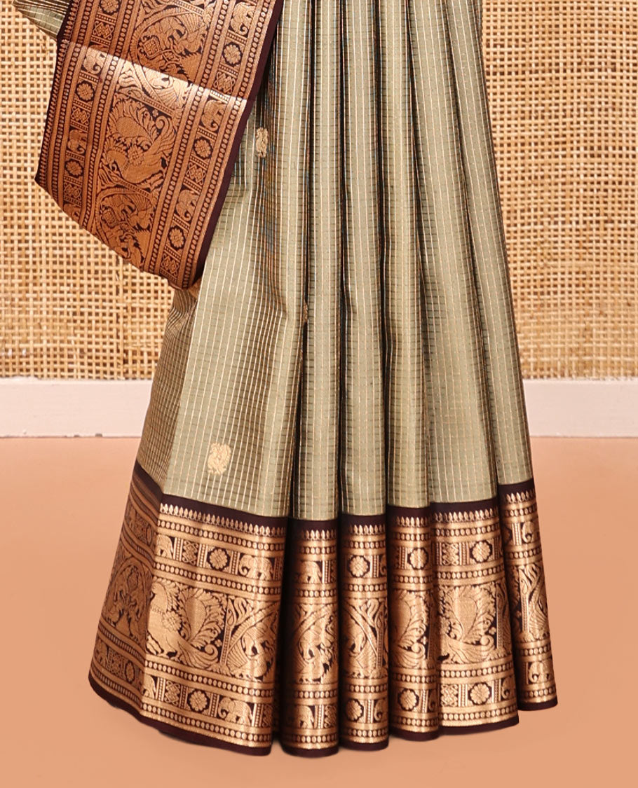 Beige Vasundhara Silk Saree, Meticulously Crafted with Zari Buttas and Checks, a Contrast Border of Thilakam Mokku, Paisa, Kamalam, Yaanai, and Mayil, Jaal Pallu, and a Contrast Blouse