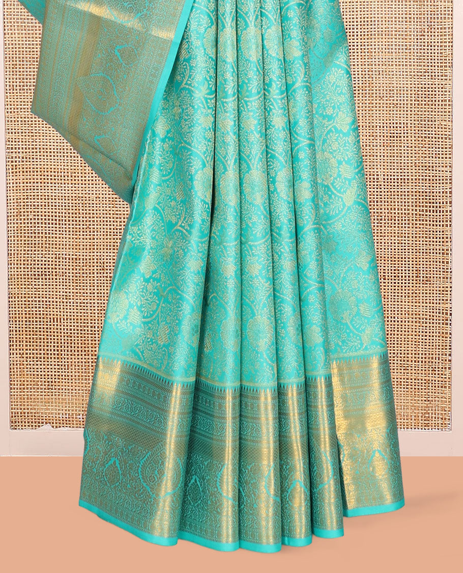 Turquoise Jacquard Kanchipuram Wedding Silk Saree, Highlighted by a Zari Border of Rekku, Muthu, Poun, Kodi Visiry, and Mayil Kann Designs, Grand Pallu, and Matching Blouse