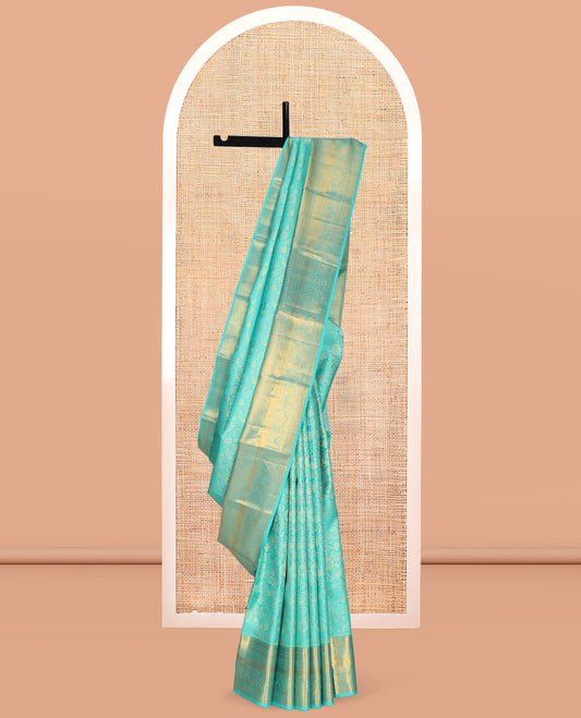 Turquoise Jacquard Kanchipuram Wedding Silk Saree, Highlighted by a Zari Border of Rekku, Muthu, Poun, Kodi Visiry, and Mayil Kann Designs, Grand Pallu, and Matching Blouse