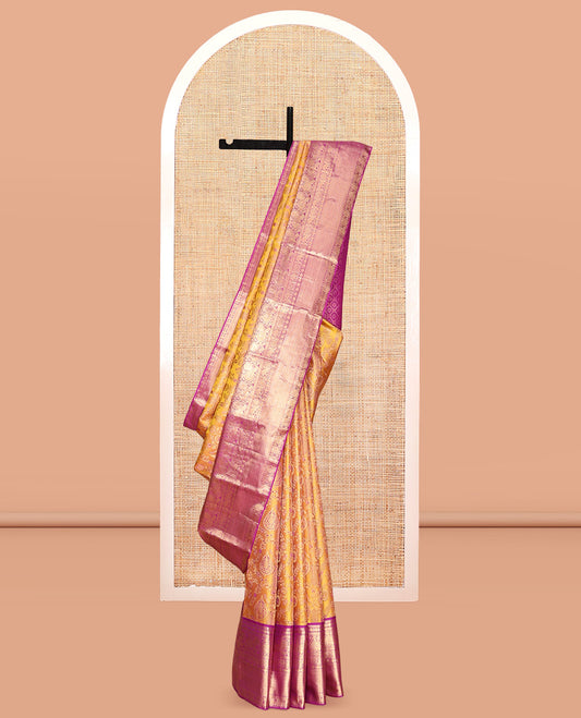 Yellow Kanchipuram Wedding Silk Saree, Embellished with Jacquard Design, a Contrast Border of Thilakam, Rudraksham, Mayil, Yaanai, Chakram, and Mayil Kann, Grand Pallu, and a Contrast Blouse