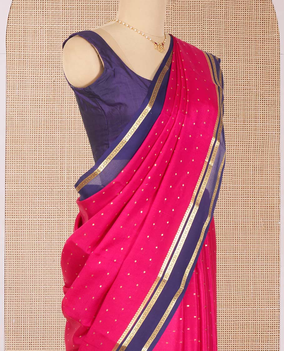 Pink Mysore Silk Saree Detailed with Zari Buttas, Complemented by a Contrast Border Featuring Traditional Zari Designs, Pallu Steeped with Zari Stripes, and Paired with a Contrast Blouse