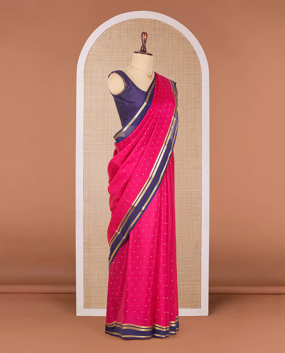 Pink Mysore Silk Saree Detailed with Zari Buttas, Complemented by a Contrast Border Featuring Traditional Zari Designs, Pallu Steeped with Zari Stripes, and Paired with a Contrast Blouse
