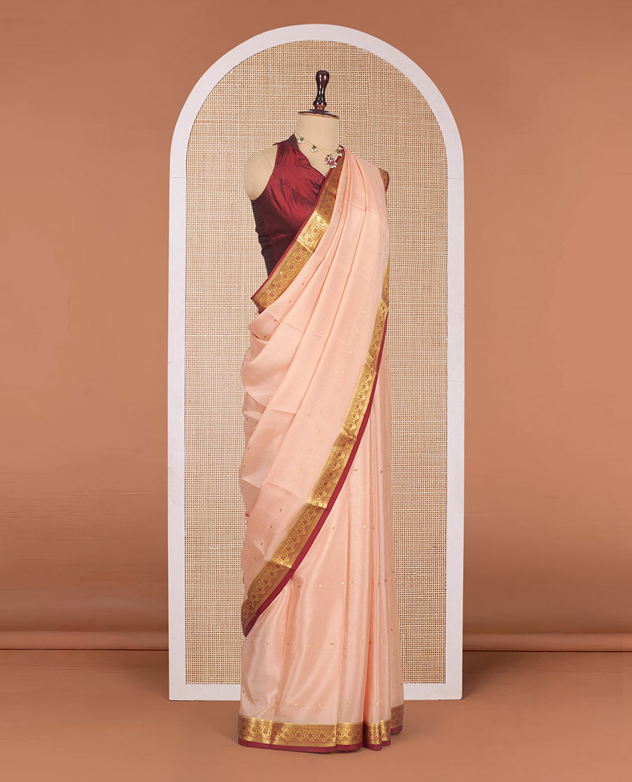 Light Peach Mysore Silk Saree, Mesmerized with Zari Buttas All Over Its Body, Complemented by a Contrast Traditional Zari Design Border, Zari-Buttas Woven Pallu, and Paired with a Contrast Blouse