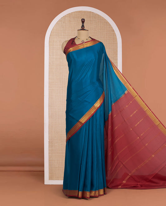 Blue Plain Mysore Silk Saree, Complemented by a Contrast Traditional Zari Design Border, Zari Striped Pallu, and Paired with a Contrast Blouse