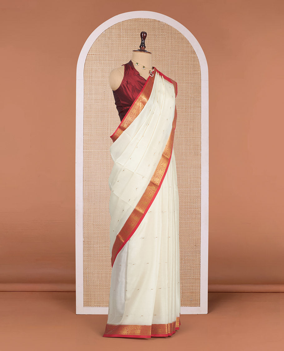 White Mysore Silk Saree, Sparsely Sparkled with Zari Buttas All Over Its Body, Complemented by a Contrast Traditional Zari Design Border, Zari-Buttas Woven Pallu, and Paired with a Contrast Blouse
