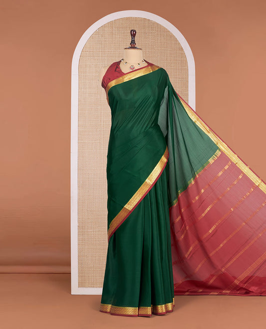 Bottle Green Plain Mysore Silk Saree, Complemented by a Contrast Traditional Zari Design Border, Zari Striped Pallu, and Paired with a Contrast Blouse