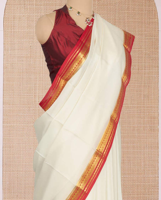 White Plain Mysore Silk Saree, Complemented by a Contrast Traditional Zari Design Border, Zari Striped Pallu, and Paired with a Contrast Blouse