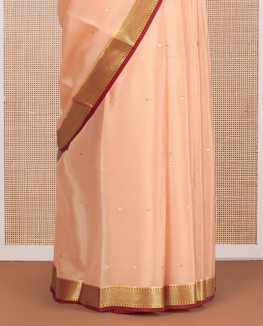 Cantaloupe Orange Mysore Silk Saree, Mesmerized with Zari Buttas All Over Its Body, Complemented by a Contrast Traditional Zari Design Border, Zari-Buttas Woven Pallu, and Paired with a Contrast Blouse
