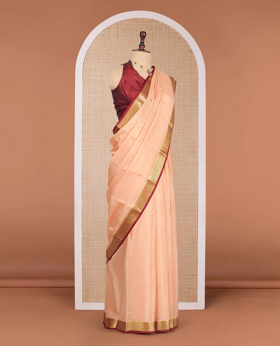 Cantaloupe Orange Mysore Silk Saree, Mesmerized with Zari Buttas All Over Its Body, Complemented by a Contrast Traditional Zari Design Border, Zari-Buttas Woven Pallu, and Paired with a Contrast Blouse