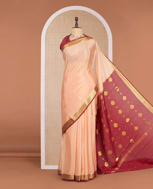 Cantaloupe Orange Mysore Silk Saree, Mesmerized with Zari Buttas All Over Its Body, Complemented by a Contrast Traditional Zari Design Border, Zari-Buttas Woven Pallu, and Paired with a Contrast Blouse