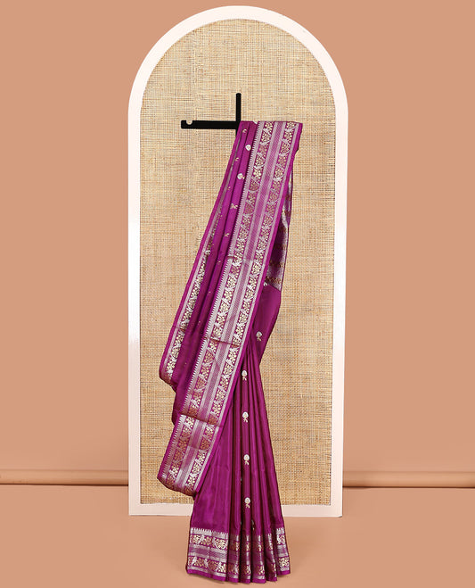 Magenta zari buttas Venkatagiri silk saree, zari border of bird and floral creeper designs, and pallu of rudraksham and floral motifs