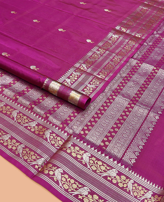 Magenta zari buttas Venkatagiri silk saree, zari border of bird and floral creeper designs, and pallu of rudraksham and floral motifs