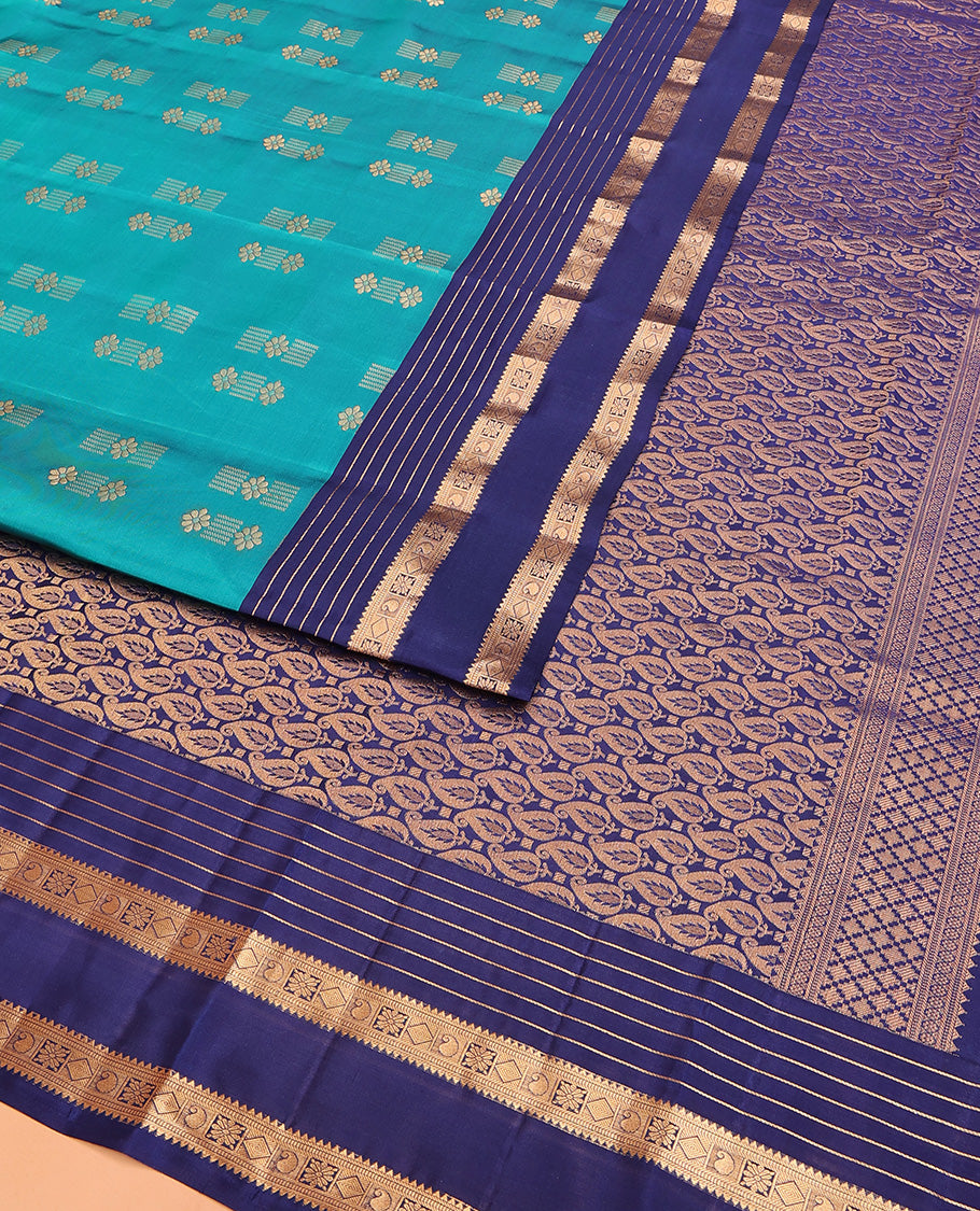 Blue Vasundhara Lite Silk Mix Saree Embellished with Zari Buttas, Complemented with a Contrast Border Depicting Rekku, Muthu, Diamond, and Manga Designs, Adorned with a Manga Design Pallu, and a Contrast Blouse