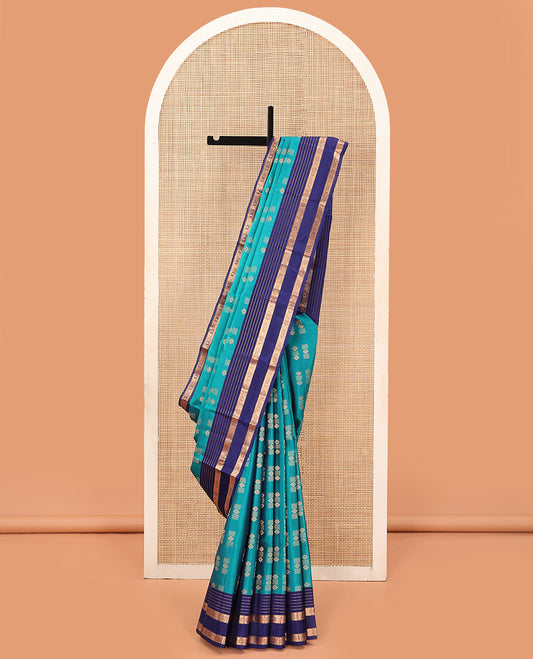 Blue Vasundhara Lite Silk Mix Saree Embellished with Zari Buttas, Complemented with a Contrast Border Depicting Rekku, Muthu, Diamond, and Manga Designs, Adorned with a Manga Design Pallu, and a Contrast Blouse