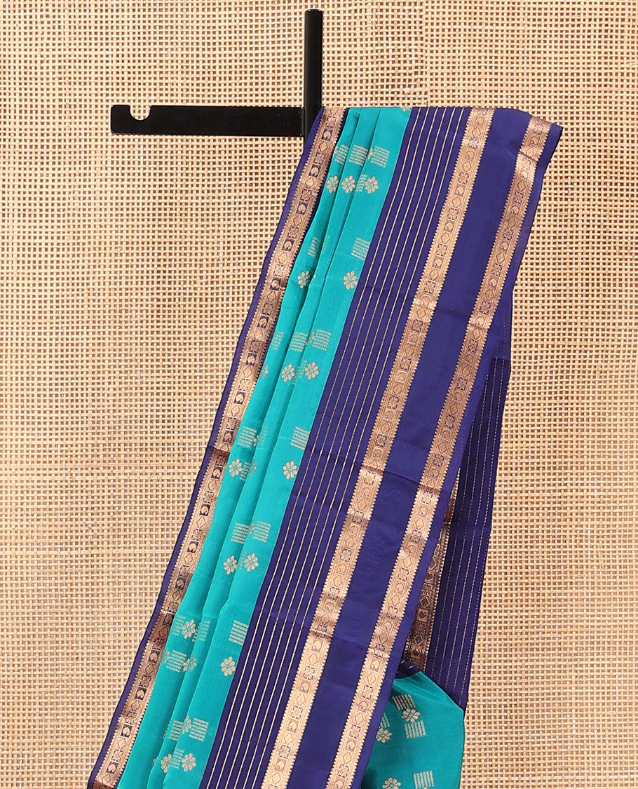 Blue Vasundhara Lite Silk Mix Saree Embellished with Zari Buttas, Complemented with a Contrast Border Depicting Rekku, Muthu, Diamond, and Manga Designs, Adorned with a Manga Design Pallu, and a Contrast Blouse