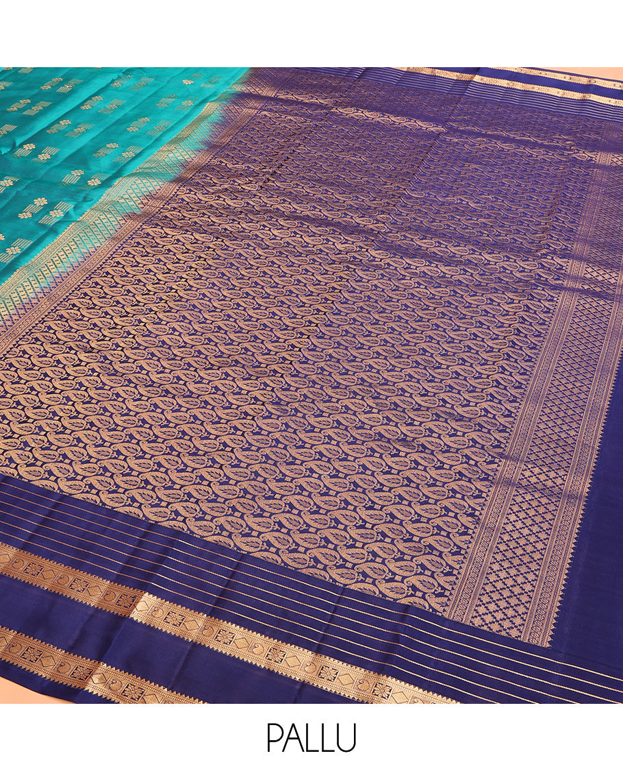 Blue Vasundhara Lite Silk Mix Saree Embellished with Zari Buttas, Complemented with a Contrast Border Depicting Rekku, Muthu, Diamond, and Manga Designs, Adorned with a Manga Design Pallu, and a Contrast Blouse