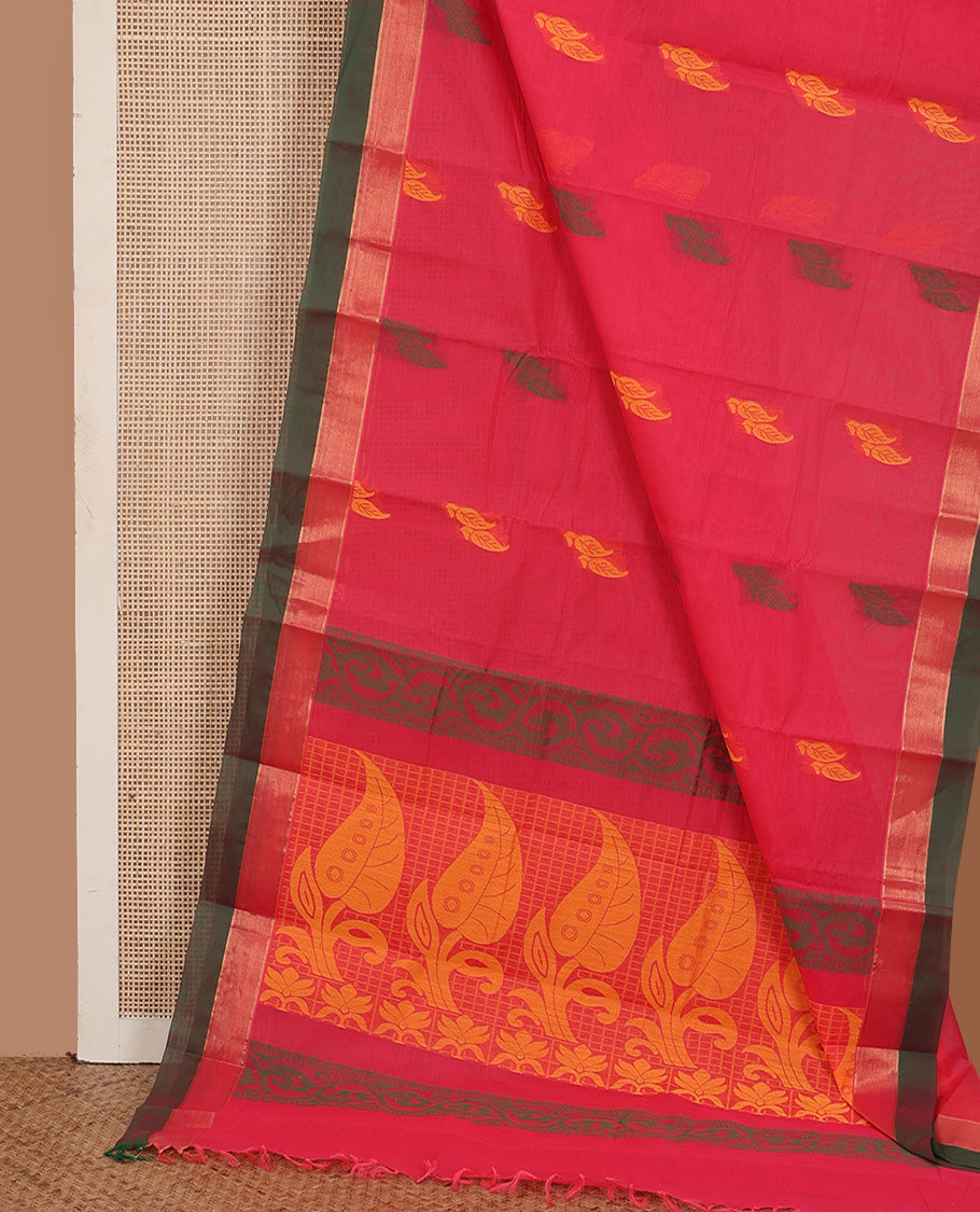 Pink buttas kanchi cotton saree, contrast zari border, and pallu of floral creeper, and leaf designs