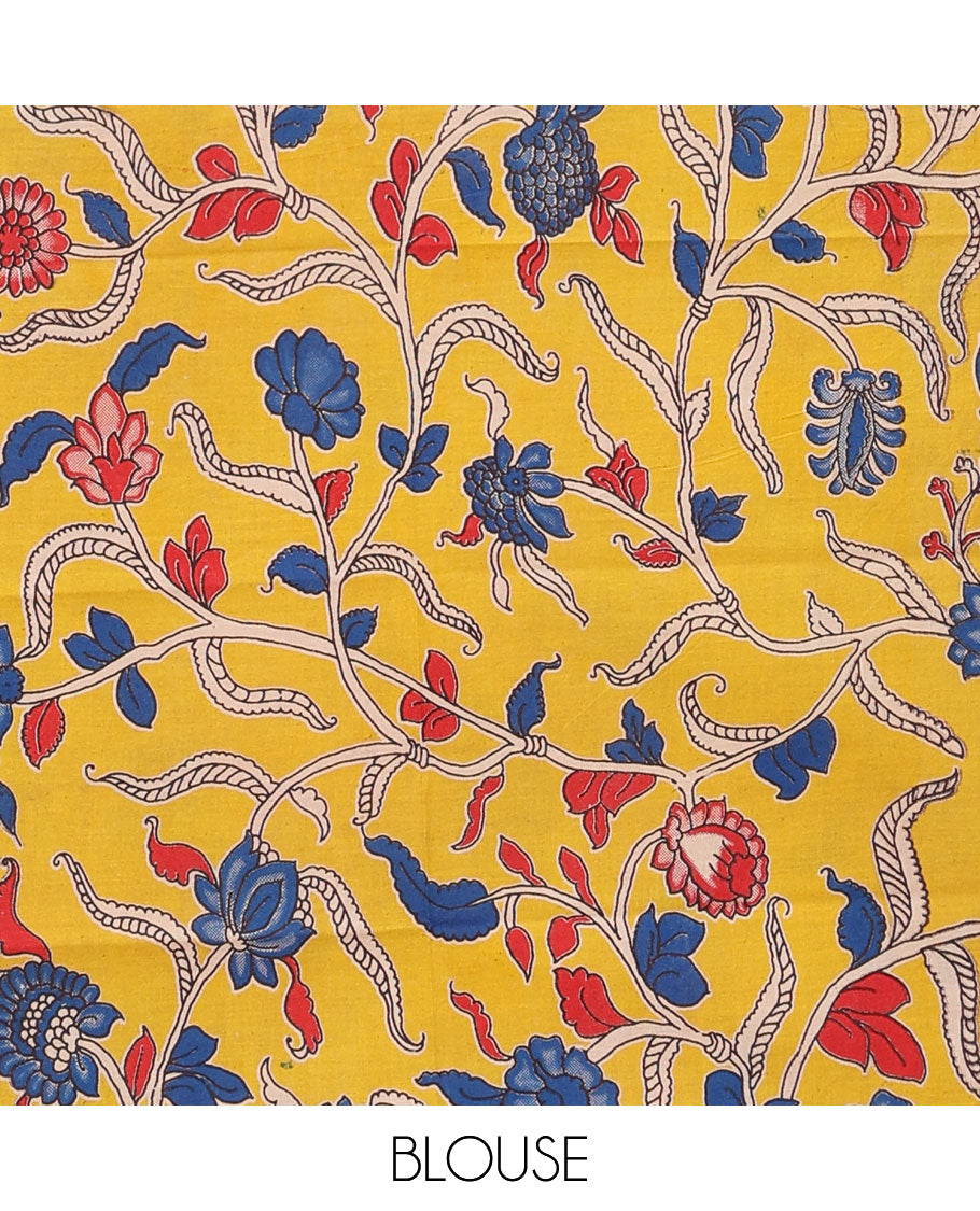 Red sparesly striped Mangalagiri Cotton saree, rettai pettu temple border, gleaming zari pallu, and contrast kalamkari floral printed blouse