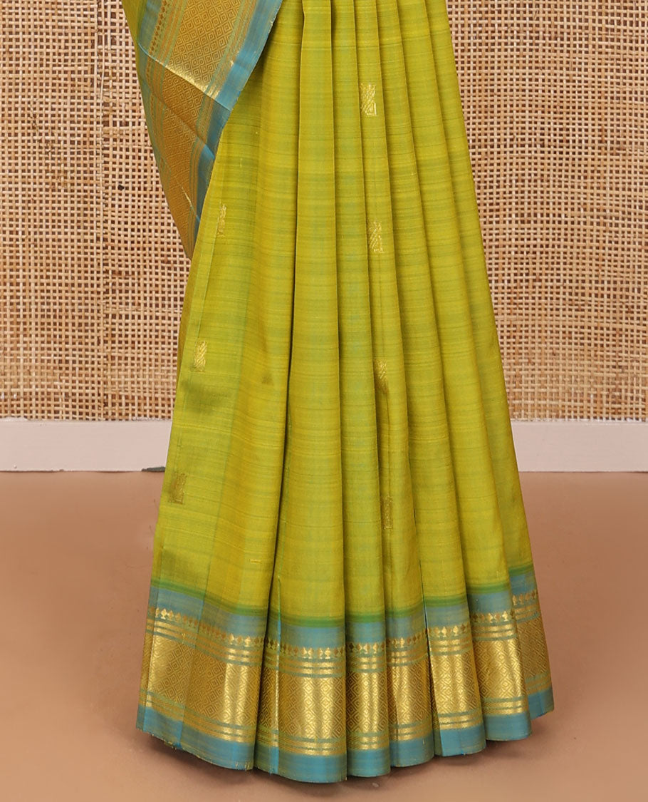 Green zari buttas Kanchipuram silk saree, contrast one-sided border of panner sombu,banaras & mayil kann & zari design pallu