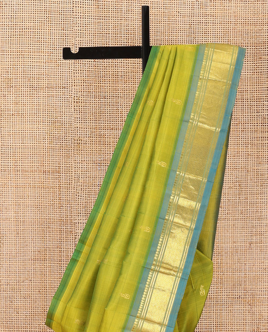 Green zari buttas Kanchipuram silk saree, contrast one-sided border of panner sombu,banaras & mayil kann & zari design pallu