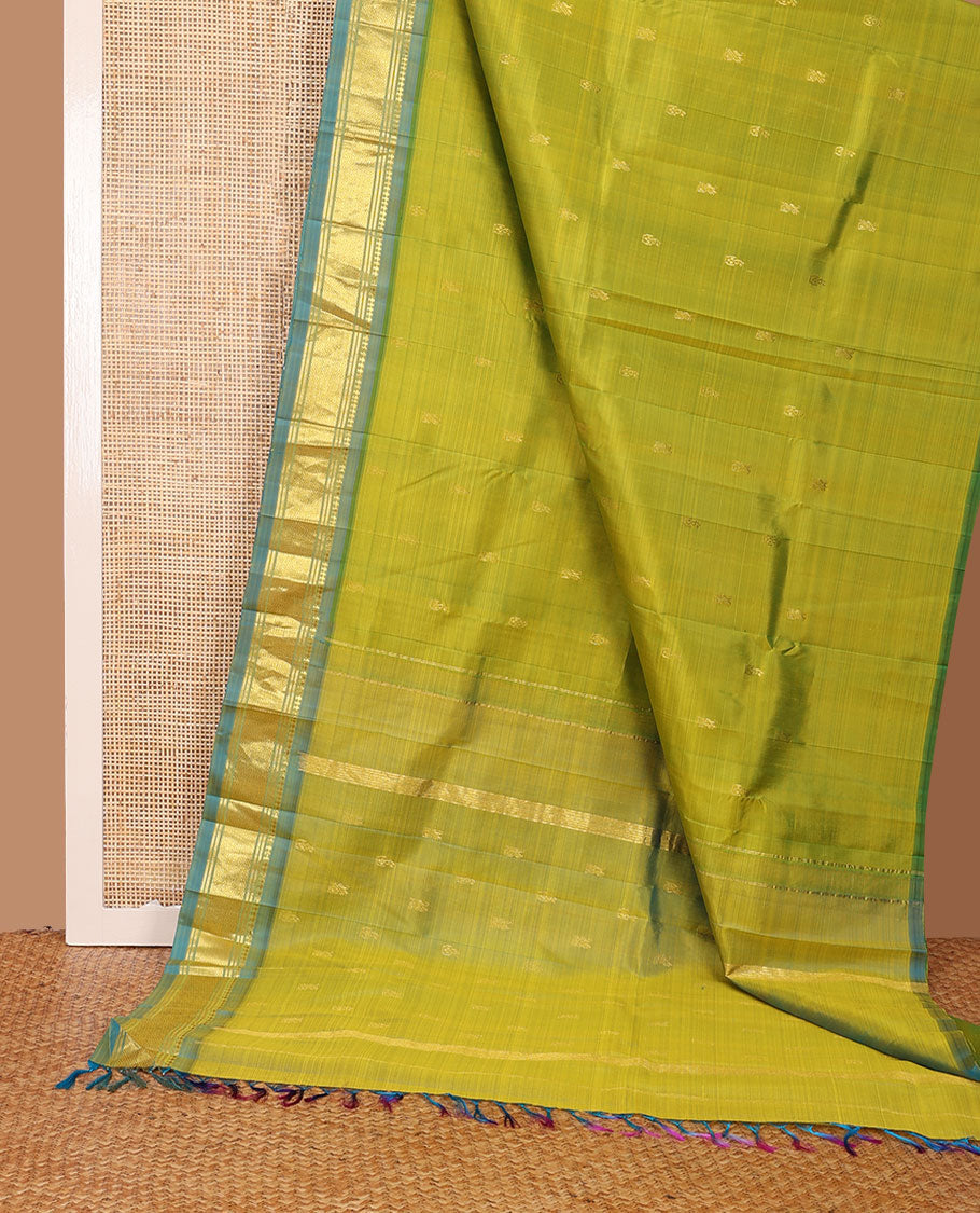 Green zari buttas Kanchipuram silk saree, contrast one-sided border of panner sombu,banaras & mayil kann & zari design pallu