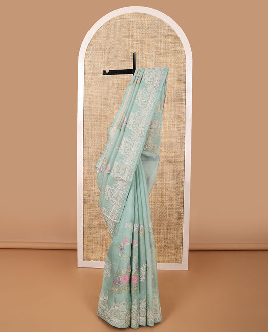 Blue all-over floral thread embroidery organza saree with self intricate design border