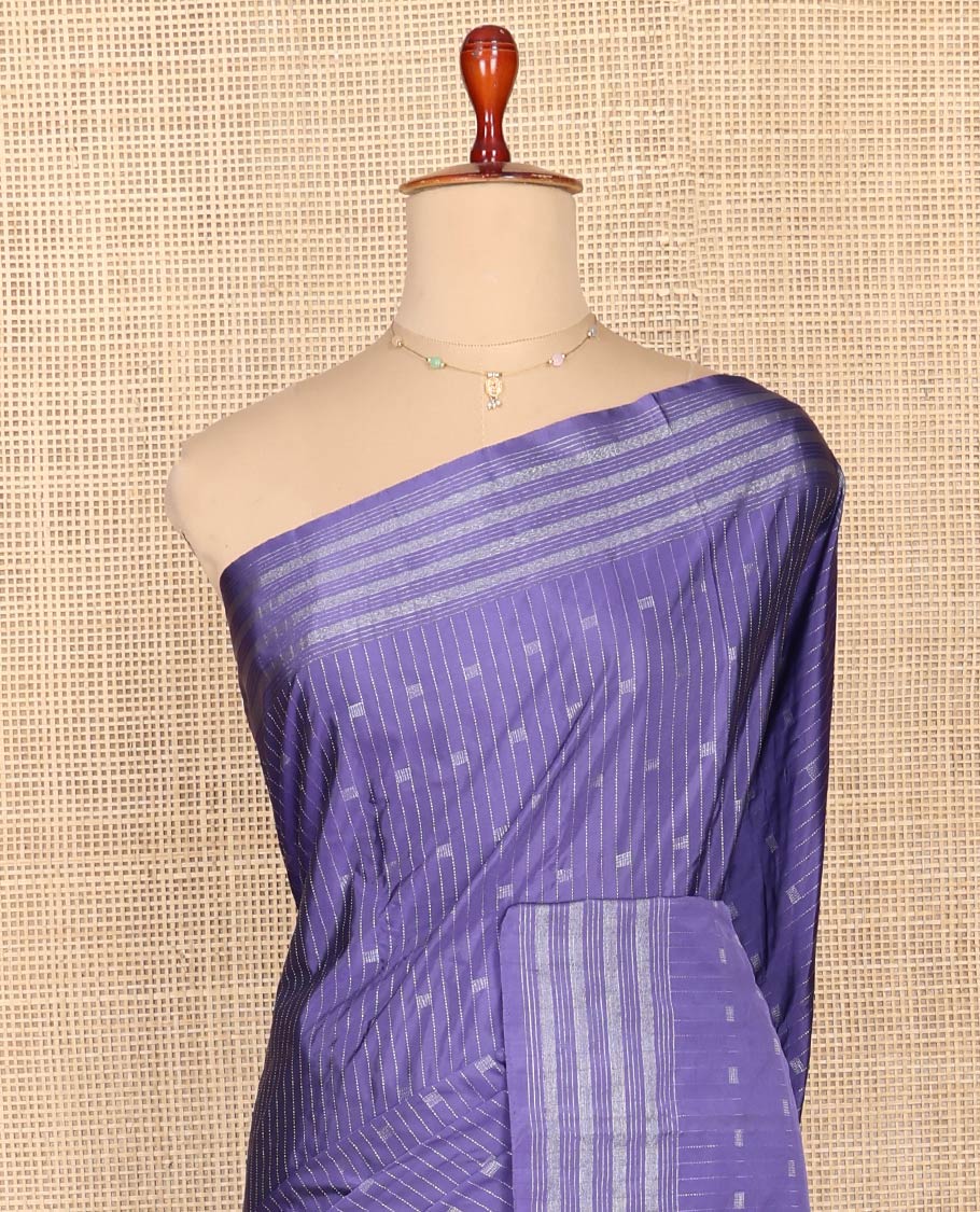 Violet Aarani Silk Saree, Uniquely Detailed with Zari Buttas and Stripes on Its Body, Highlighted by a Zari Striped Border, Pallu of Stripes and Buttas, and Paired with a Matching Blouse
