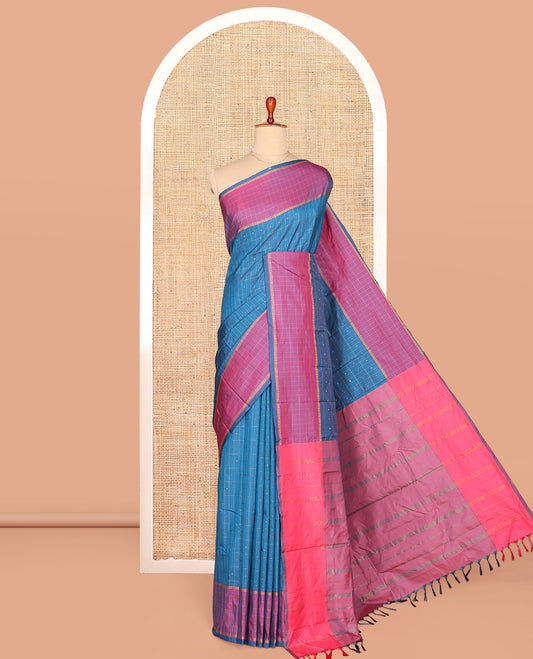 Blue Aarani Gift Saree, Decked up with Butta Enclosed Checked Designs on Its Body, Complemented by a Contrast-Checked Design Border, Zari-Striped Pallu, and Paired with a Contrast Blouse
