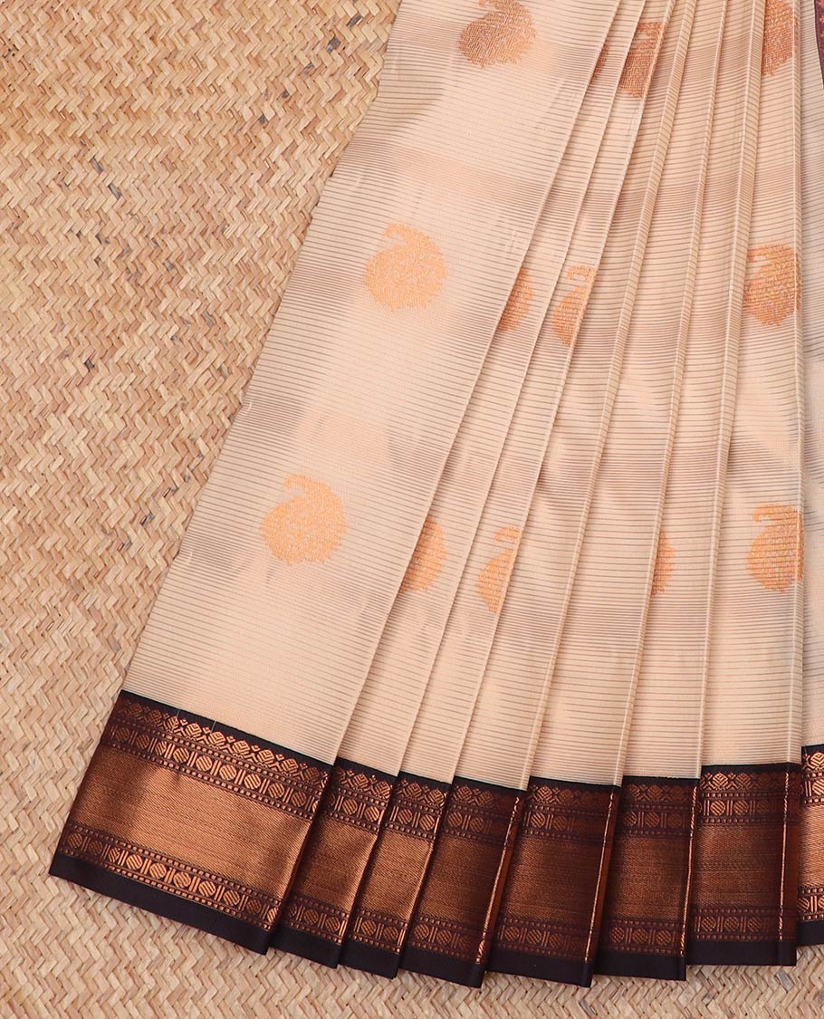 Sandal striped and paisley buttas gift saree, contrast traditional zari border, and jaal pallu