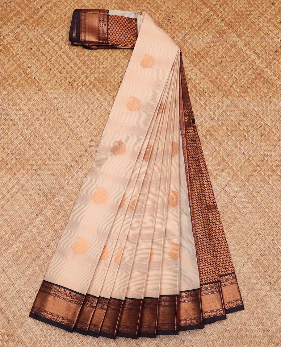 Sandal striped and paisley buttas gift saree, contrast traditional zari border, and jaal pallu