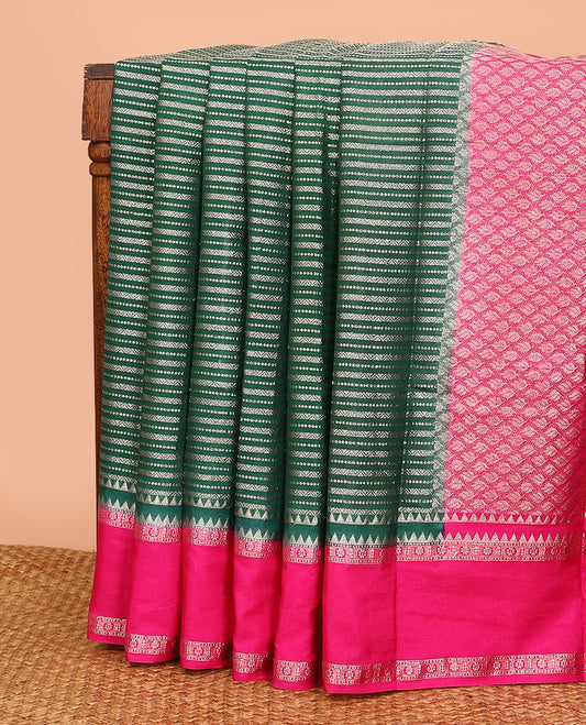 Dark green zig-zag stripes with polka dots zari woven assam silk saree, contrast traditional motifs woven double border, and zari jaal pallu