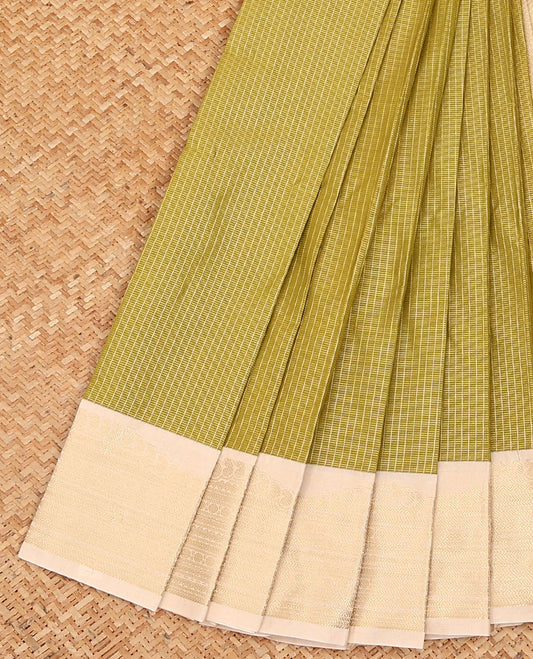 Green checked budget silk saree, contrast traditional zari design birder, and jaal pallu