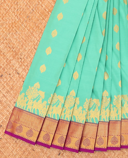 Turquoise buttas and human motifs budget silk saree, contrast traditional zari design border, and intricate pallu