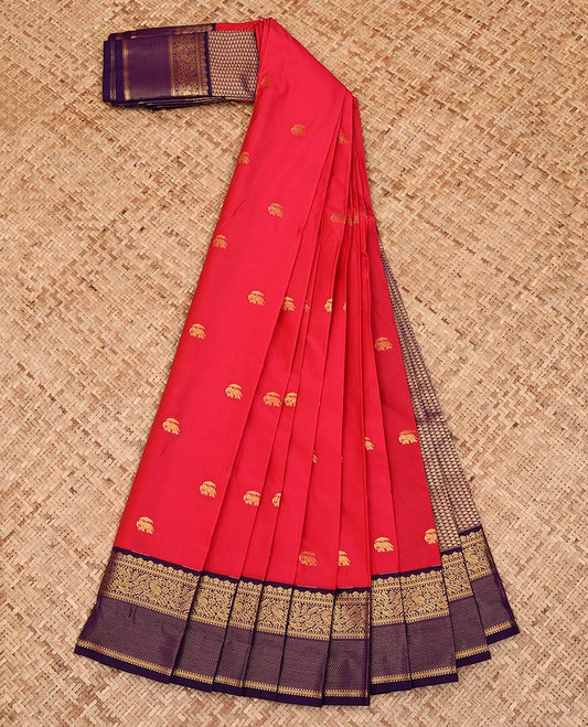 Red Budget Silk Saree, Adorned with Elephant Zari Buttas All Over Its Body, Complemented by a Contrast Traditional Zari Design Border, Grand Pallu of Jaal Designs, and Paired with a Contrast Blouse